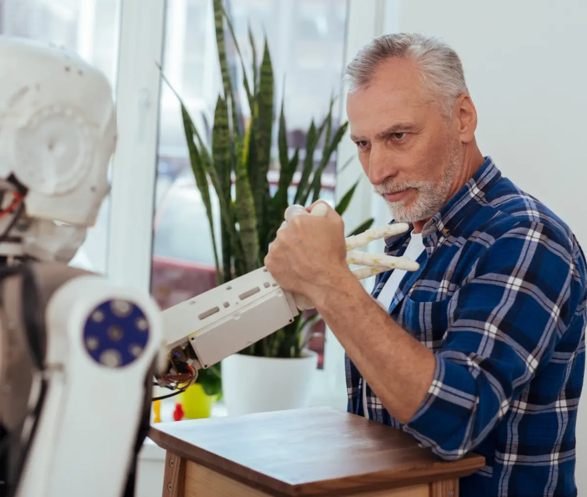 Borger lægger arm med Meta-robot